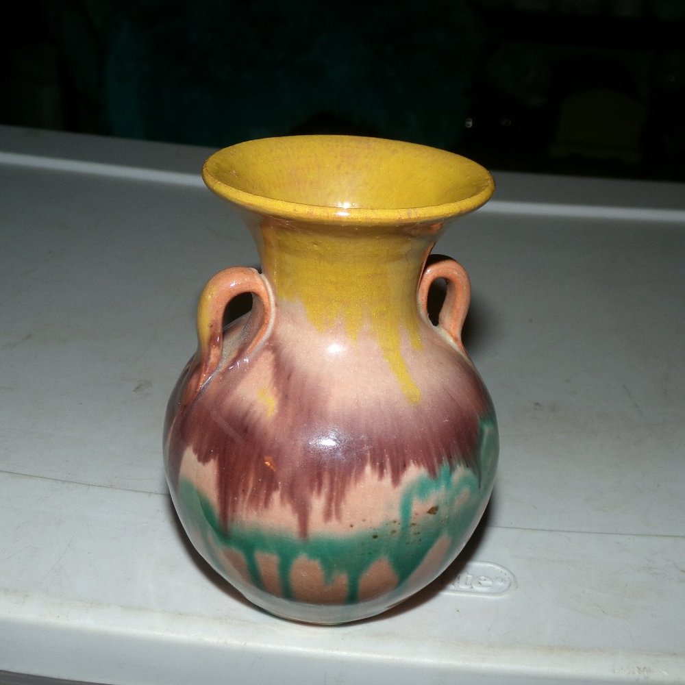 vintage clay pottery vase.